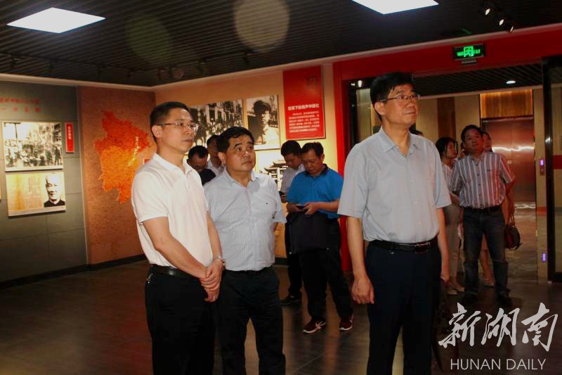 一行和新华社湖南分社党组书记,社长丁锡国一行到湖南日报社走访交流