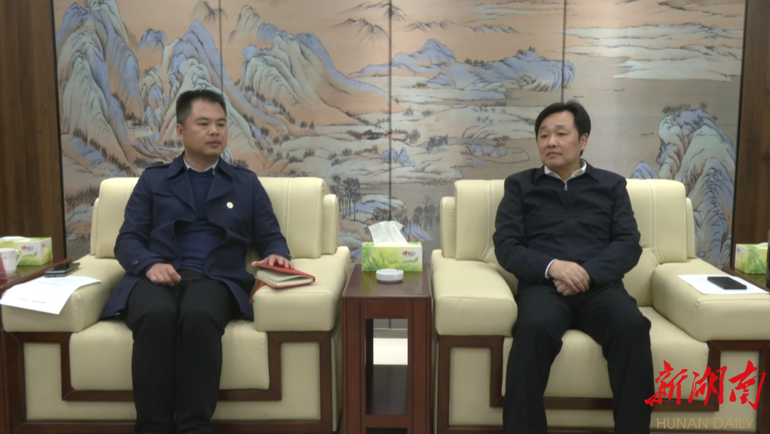 唐成会见杨建军一行