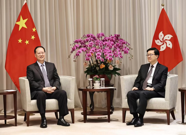 毛伟明会见李家超