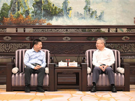 沈晓明与裘新一行会谈