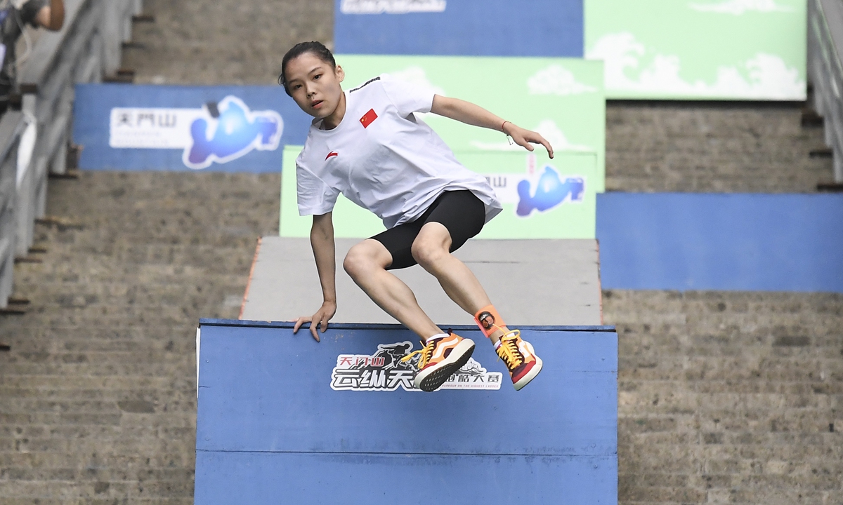 Former Chinese gymnastics captain makes history in parkour