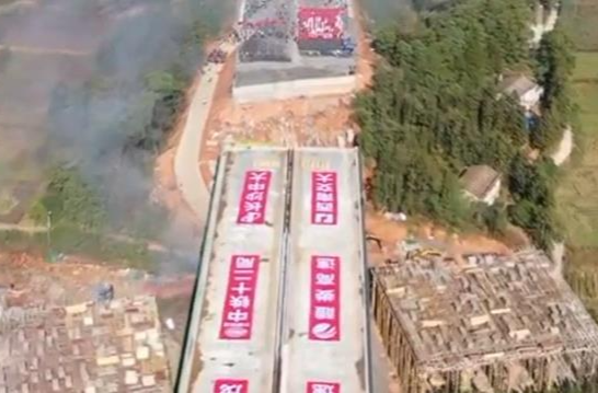 23,000-tonne bridge rotated into position in China's Hunan