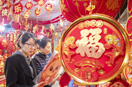 In Pics: Hustle-and-Bustle New Year Shopping Scenes Across Hunan