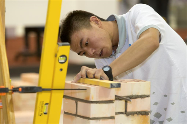 A Gen-Z Bricklayer's Path to China's Top Legislature