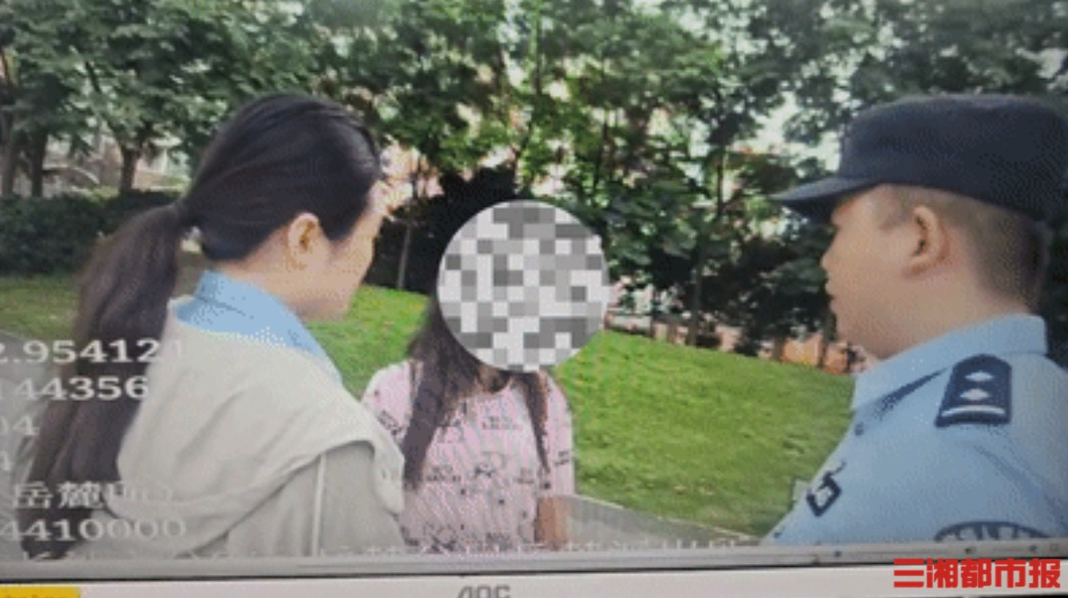 夫妻争吵女子冲向车流，女辅警将她紧紧抱住
