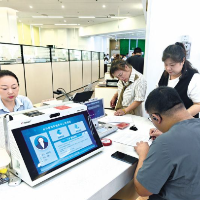 告别“两头跑”  维修金过户“自动到账”