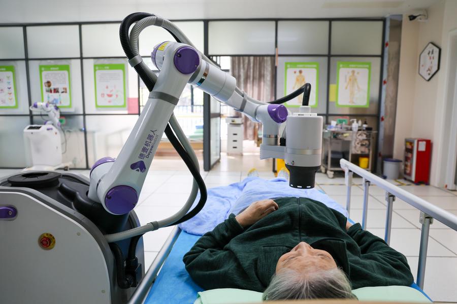China confronts senior cancer surge with early detection, TCM