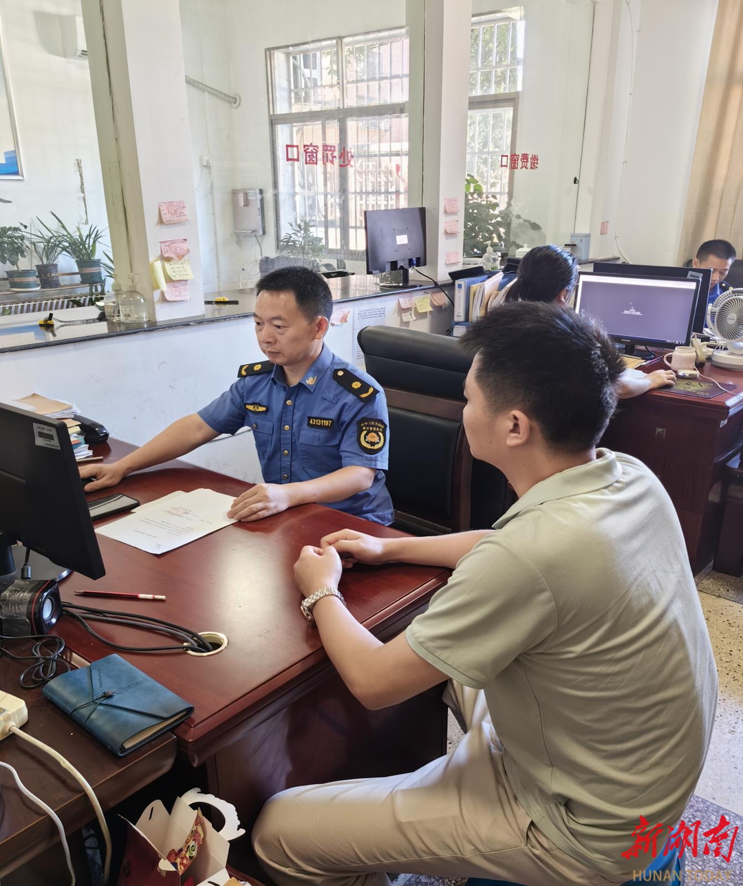 娄底城管助力企业完成信用修复 激发市场新活力