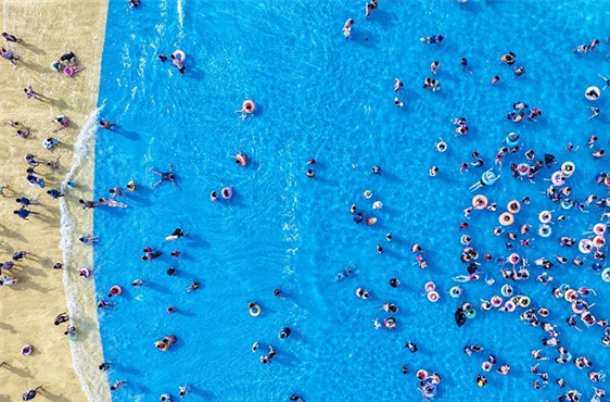 People Enjoy Water Activities During Summer Across Hunan