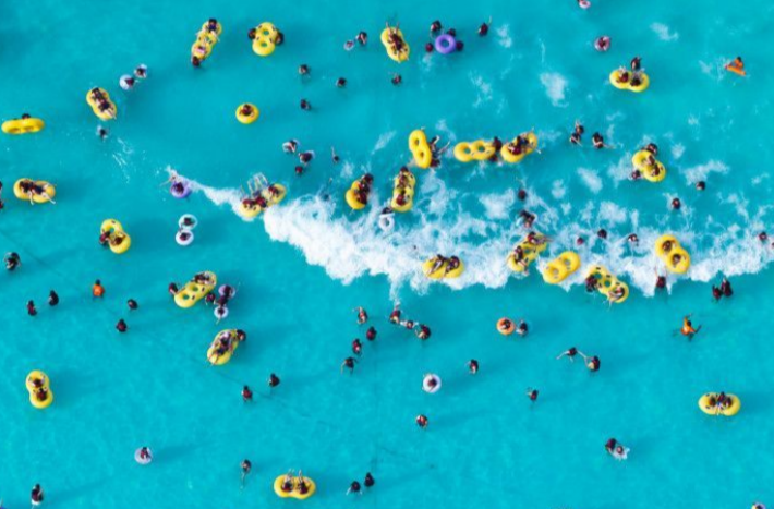 People Enjoy Water Activities to Beat Summer Heat
