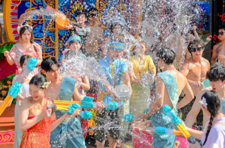 In Pics: Dai-style Water Splashing Festival at Changsha Fantawild