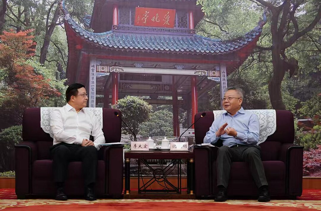 沈晓明会见海外华文媒体代表团一行