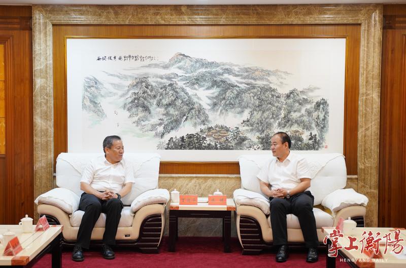 朱健會見中國石化湖南石油分公司黨委書記丁建華一行