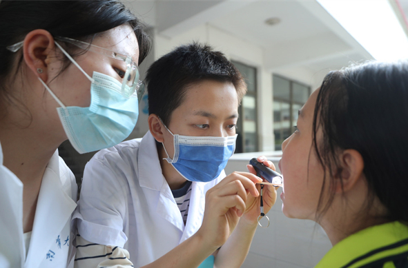 Volunteers Conducted Dental Checkups for Pupils