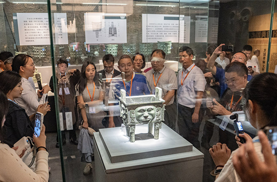 People Admire National Treasure at Bronze Museum