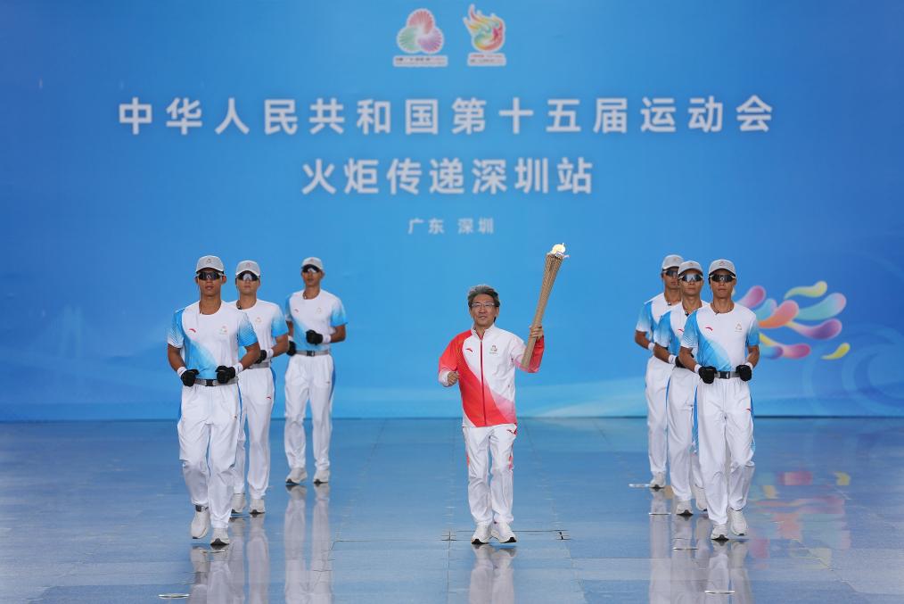 三地联动四城同传 全运会历史首次跨境火炬传递举行