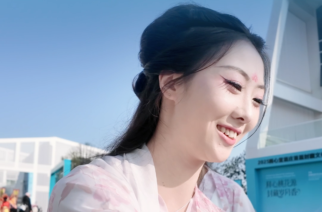 “非遗映桃影 投粮酿清欢”