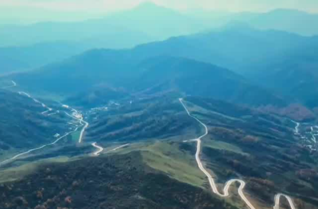 两会经纬线·一幅画里的两条路