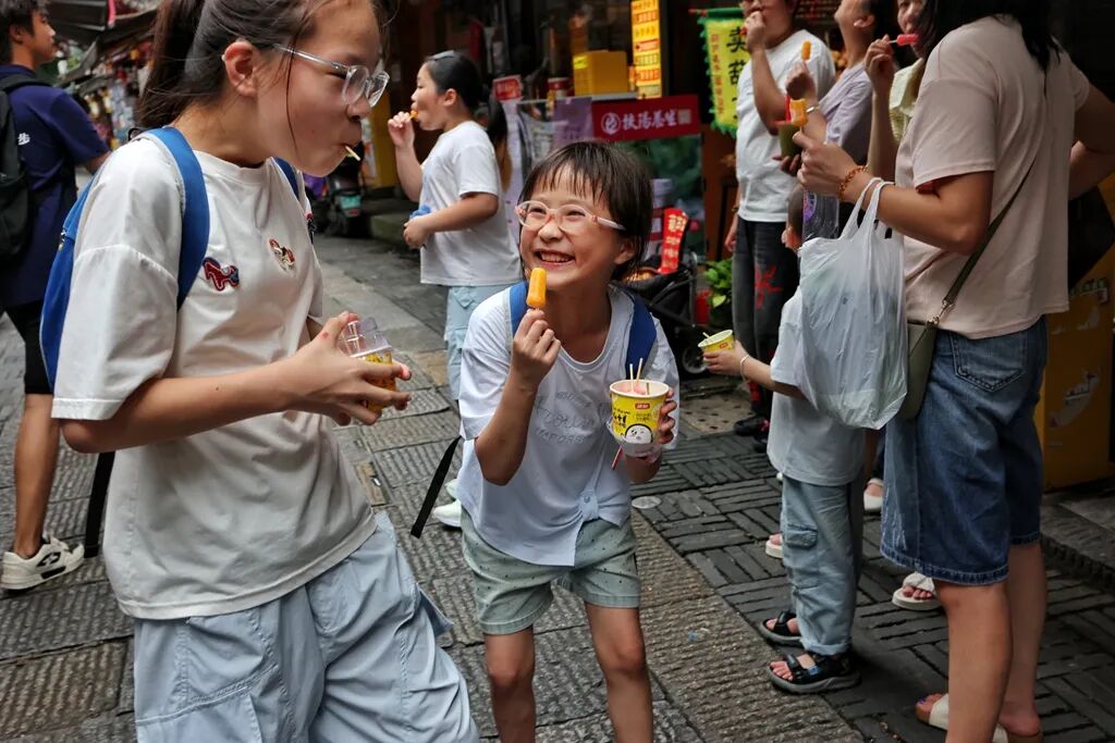 镜头里的人间烟火:彭定湘的长沙街巷慢记