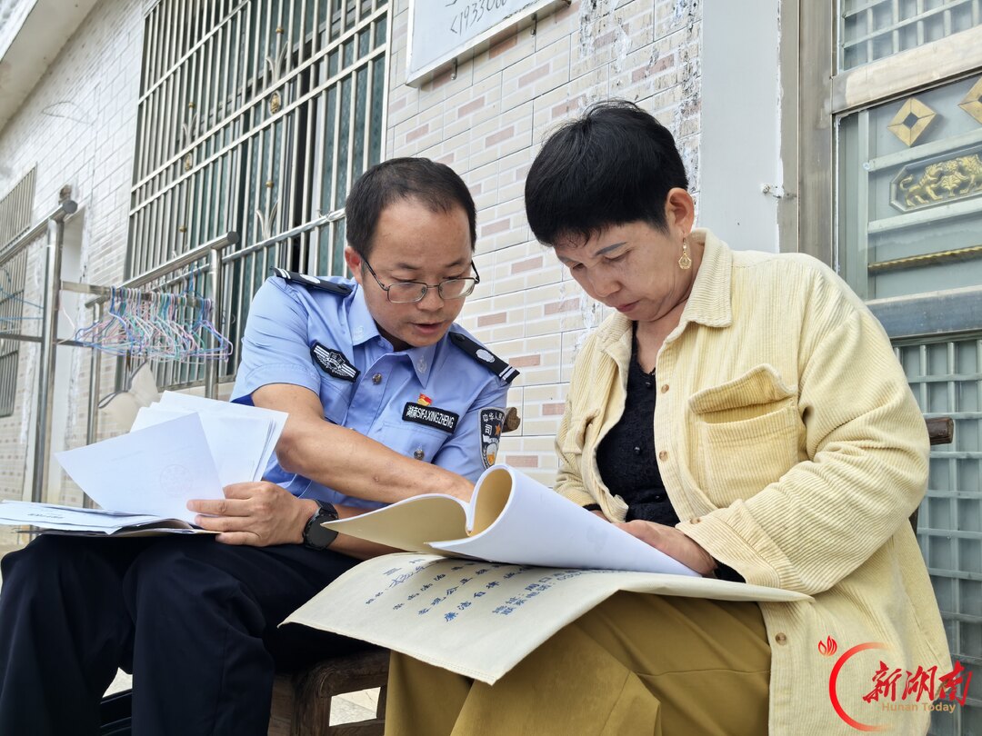 以脚步为尺 以法治暖心——记“湖南省记一等功人员”谭伟红