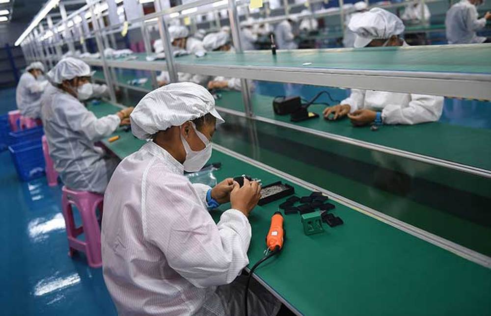 组图 | 忙碌的生产线——海南一医疗物资生产企业复工复产见闻