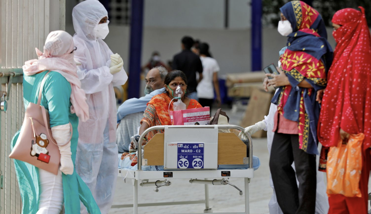 印度新增新冠肺炎确诊病例超41.4万例 累计确诊超2149万例